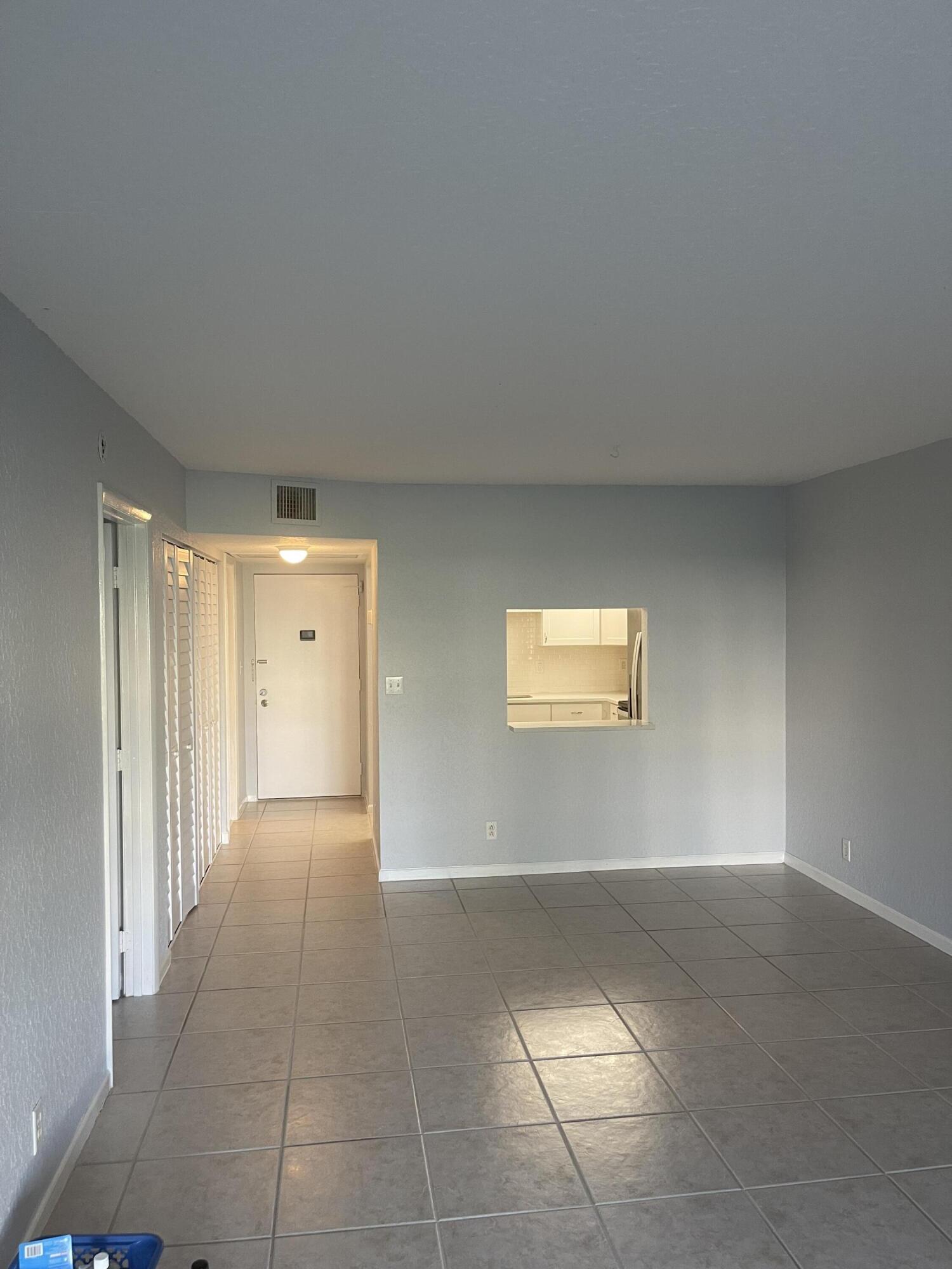 9273 Southwest 8th Street, Unit 116 Boca Raton, FL 33428 - Photo 7 of 15 Dinning - Living