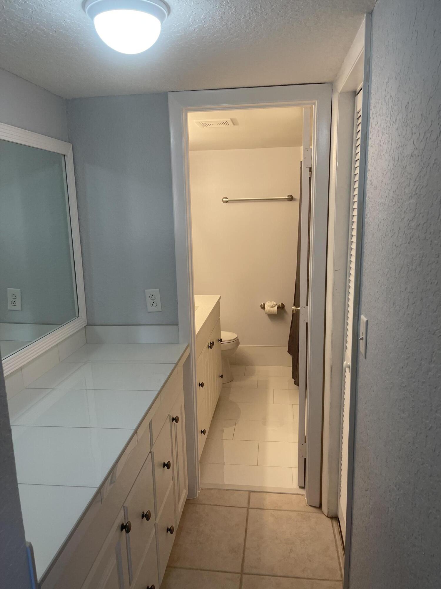 9273 Southwest 8th Street, Unit 116 Boca Raton, FL 33428 - Photo 10 of 15 Full Bathrom