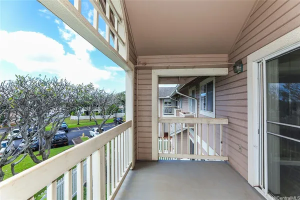 a view of a porch with furniture