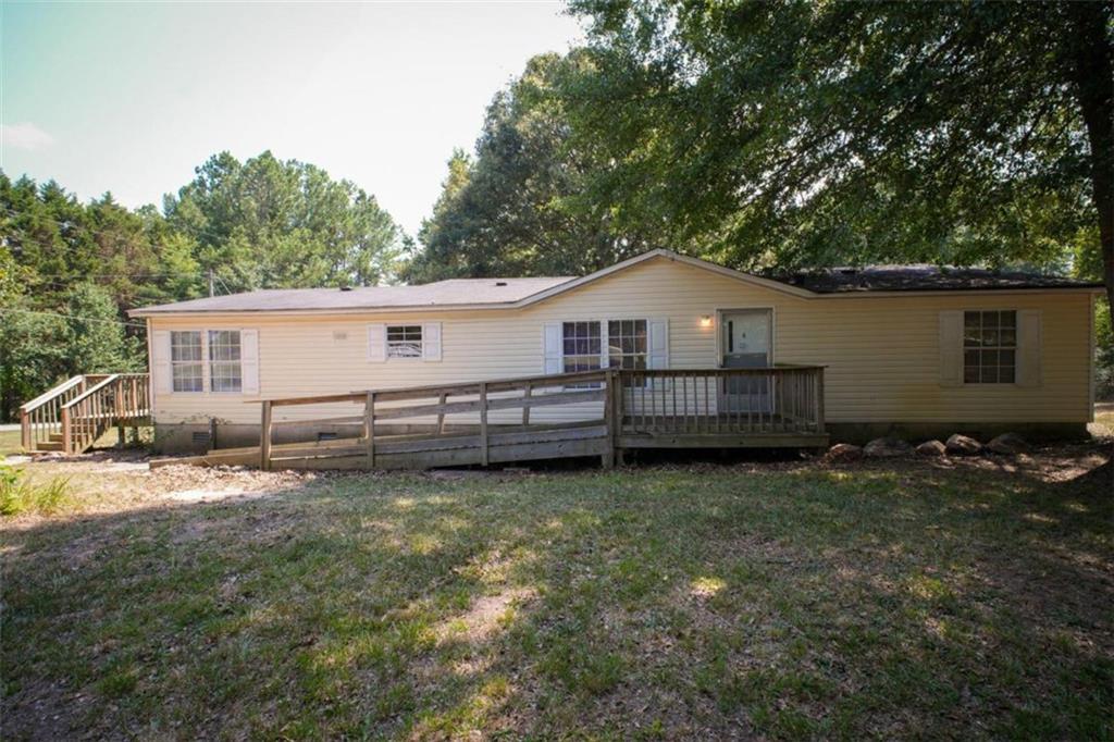747 Jim David Road Nicholson, GA 30565 - Photo 1 of 1 a house view with a garden space