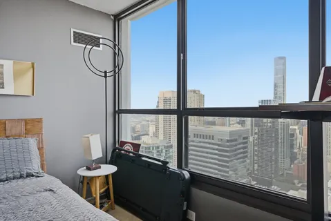 a bathroom with a sink and a window