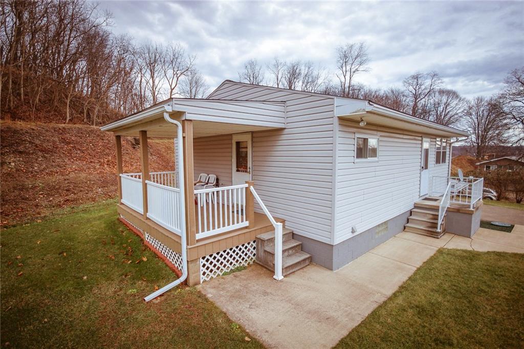 389 Mowry Road Monaca, PA 15061 - Photo 2 of 20 Side covered porch, access to eat-in kitchen.