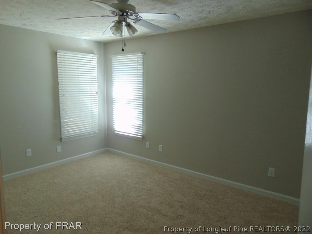 5313 Harding Drive Hope Mills, NC 28348 - Photo 13 of 26 a view of an empty room with a window