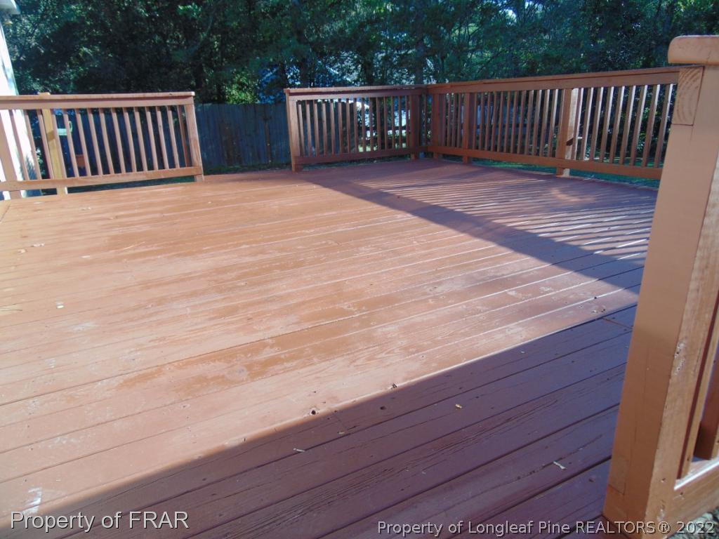 5313 Harding Drive Hope Mills, NC 28348 - Photo 15 of 26 a balcony with wooden floor