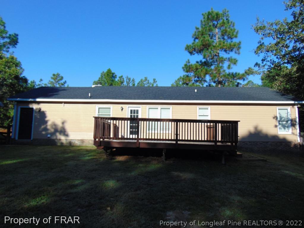 5313 Harding Drive Hope Mills, NC 28348 - Photo 25 of 26 a view of a back yard of the house