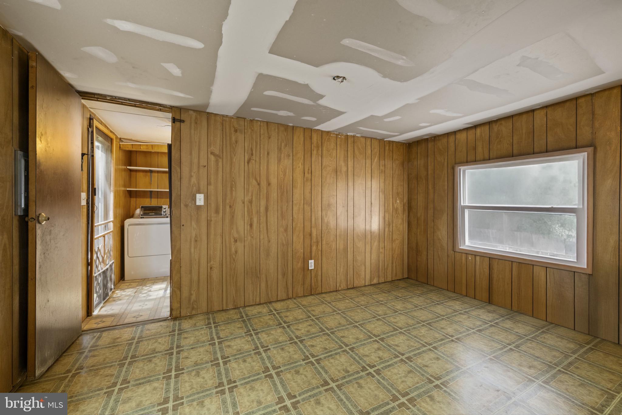 8030 Keeton Road Elkridge, MD 21075 - Photo 12 of 44 a view of an empty room with a window