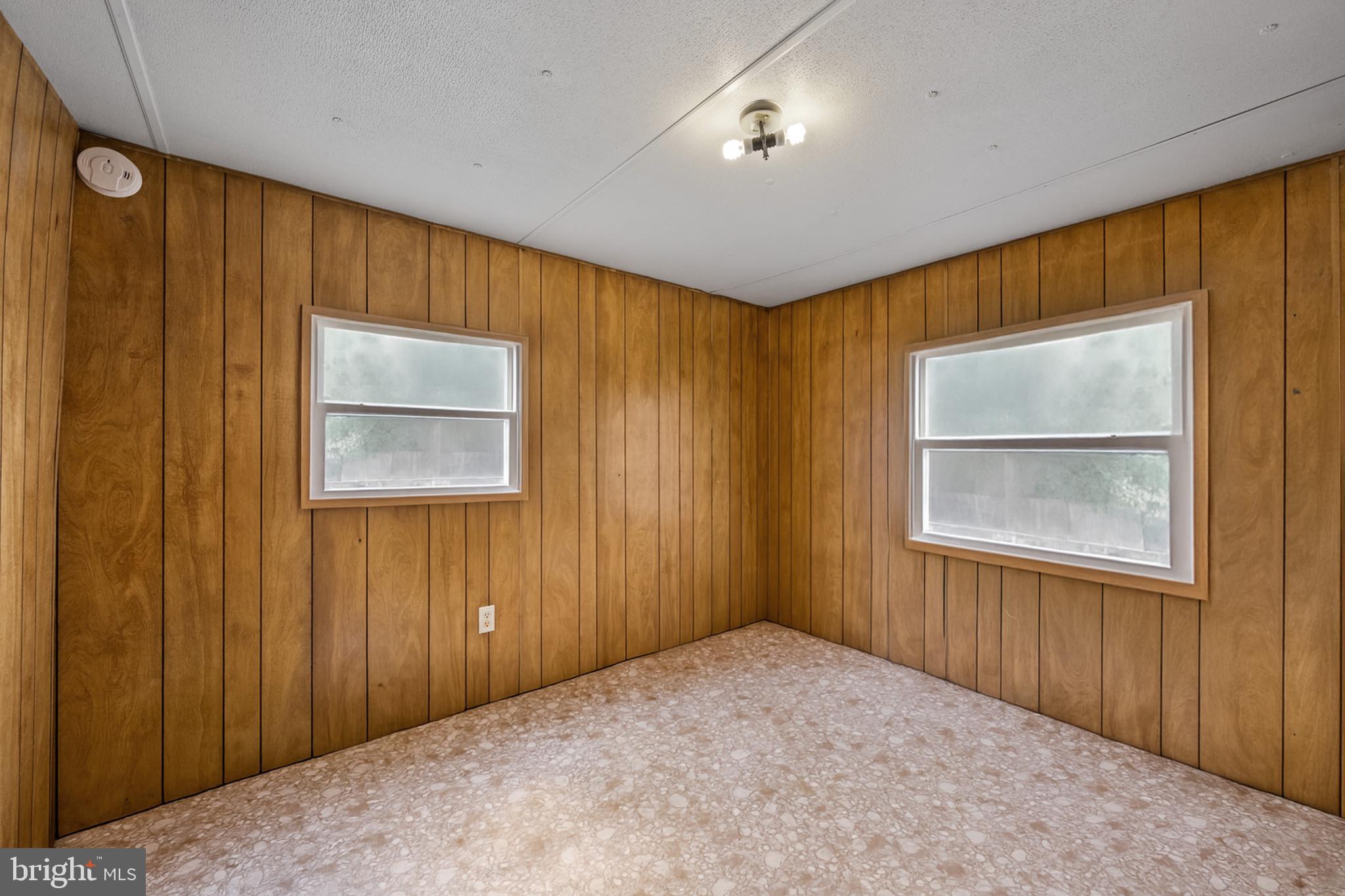 8030 Keeton Road Elkridge, MD 21075 - Photo 14 of 44 a view of an empty room with a window