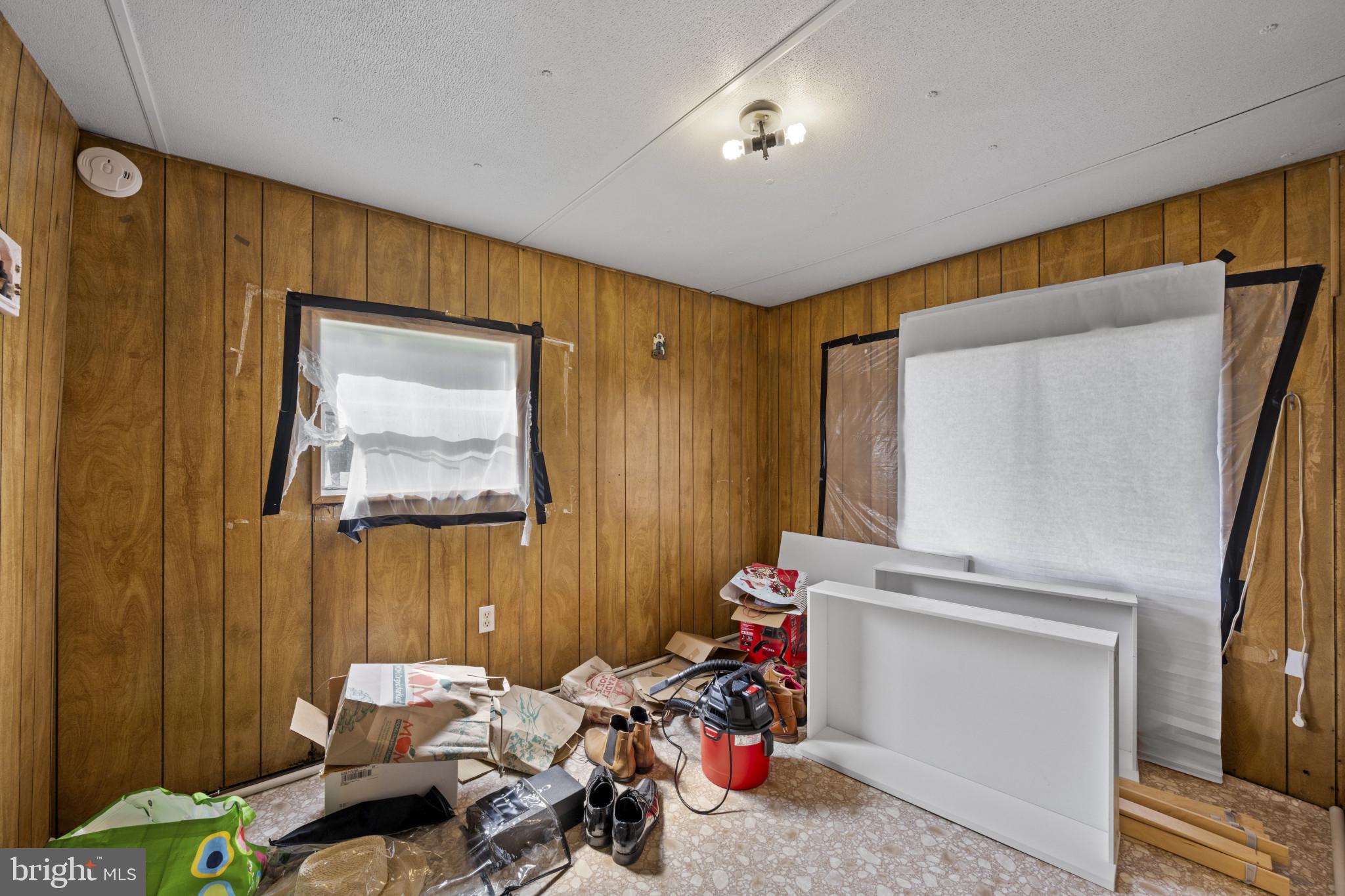 8030 Keeton Road Elkridge, MD 21075 - Photo 16 of 44 a bathroom with a sink mirror and vanity
