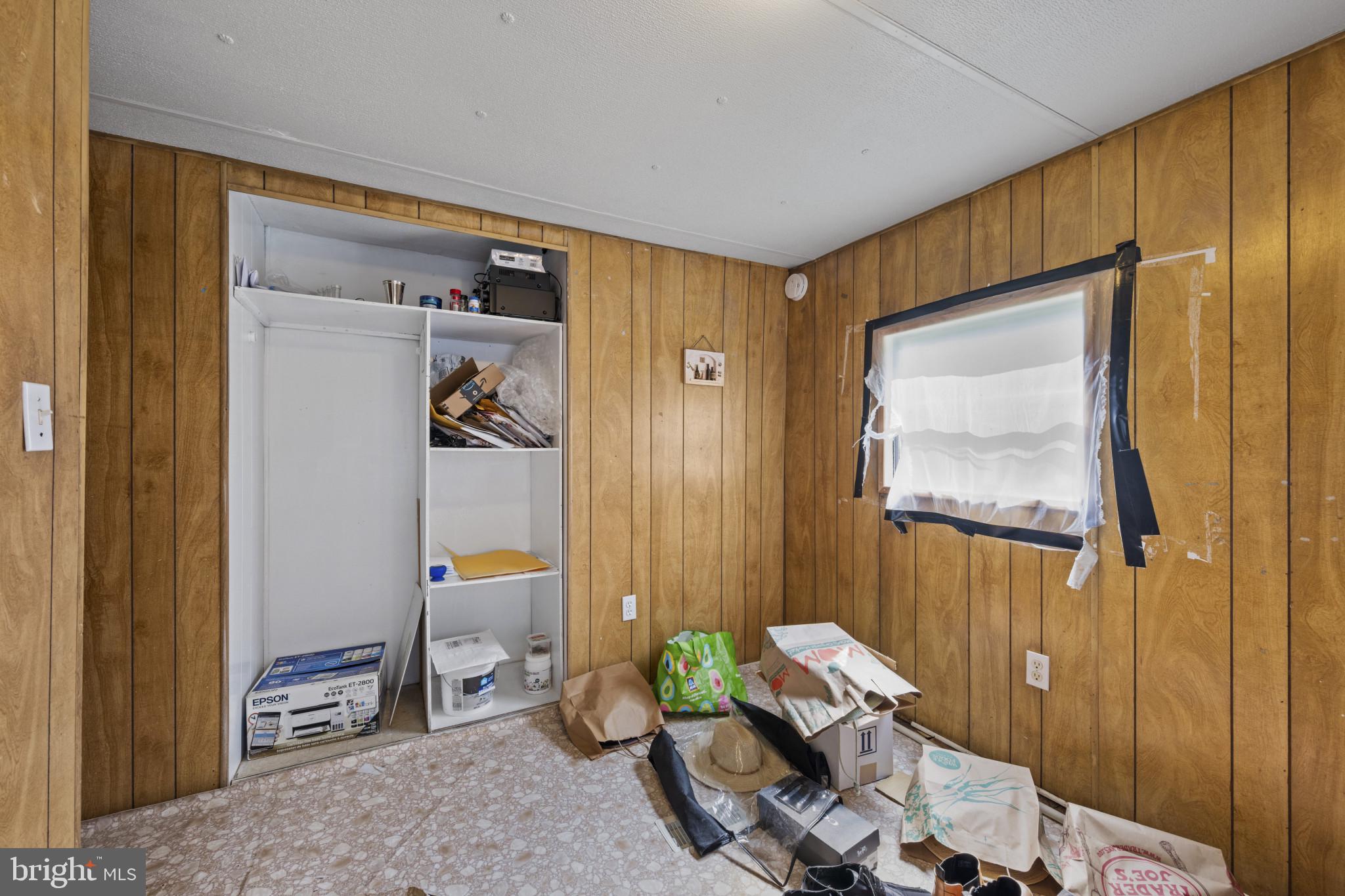 8030 Keeton Road Elkridge, MD 21075 - Photo 18 of 44 a living room with furniture and a window