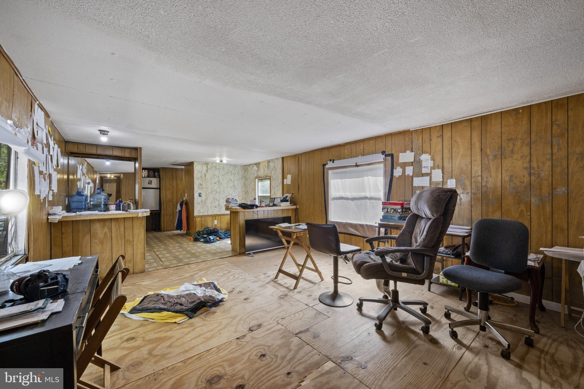 8030 Keeton Road Elkridge, MD 21075 - Photo 22 of 44 a living room with furniture and a wooden floor