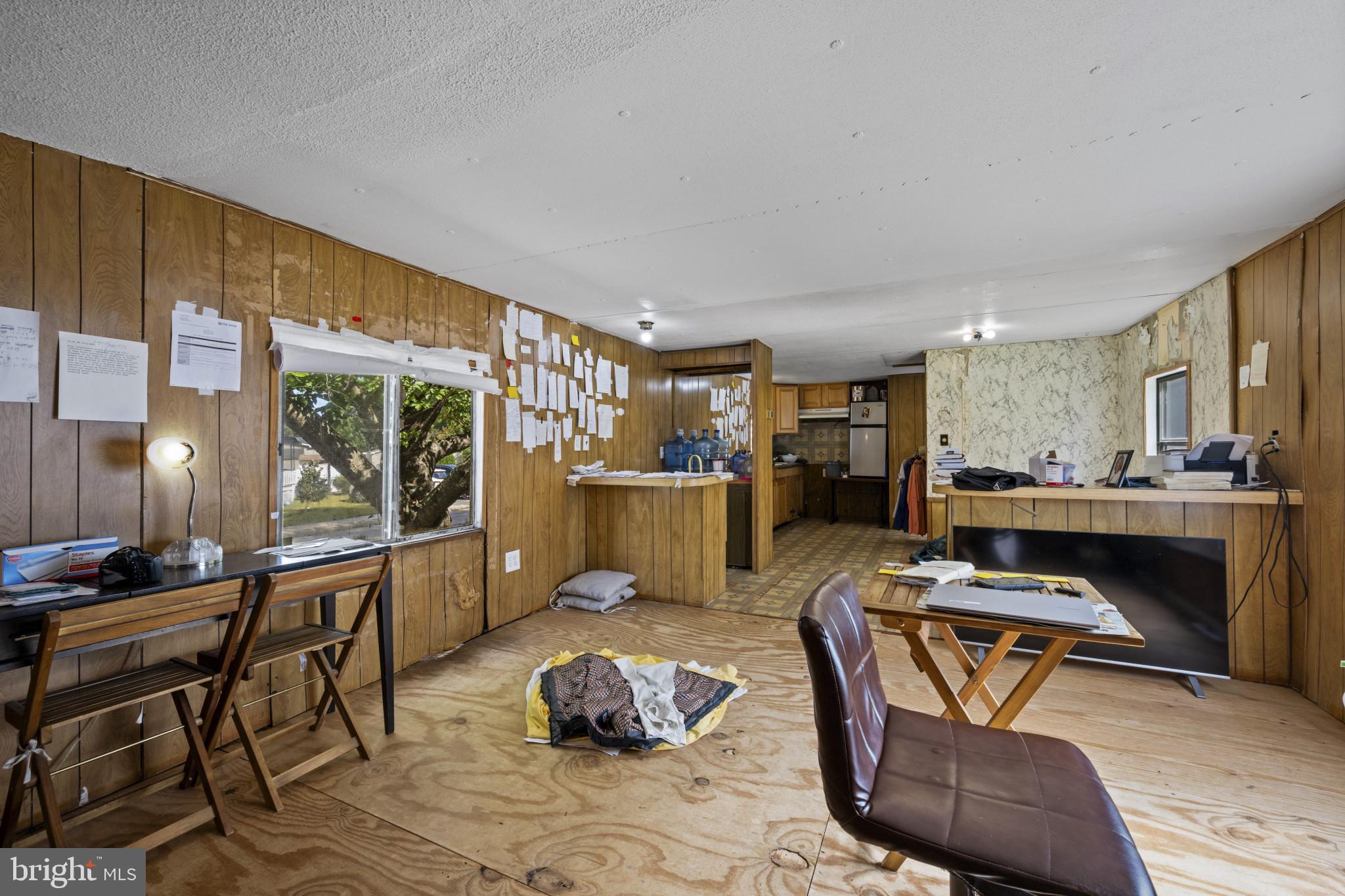 8030 Keeton Road Elkridge, MD 21075 - Photo 23 of 44 a living room with furniture and a table