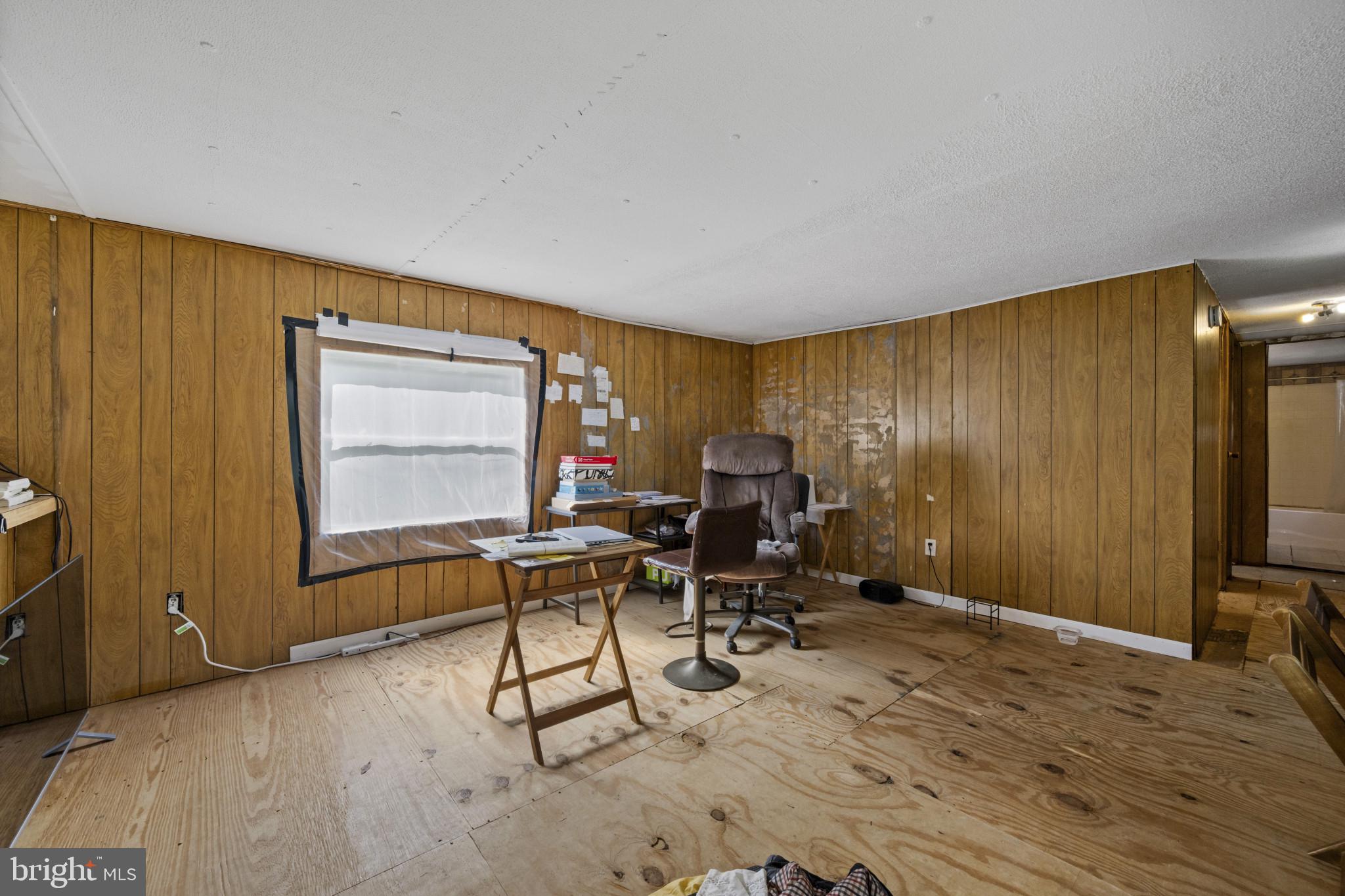 8030 Keeton Road Elkridge, MD 21075 - Photo 25 of 44 a work room with furniture and a window