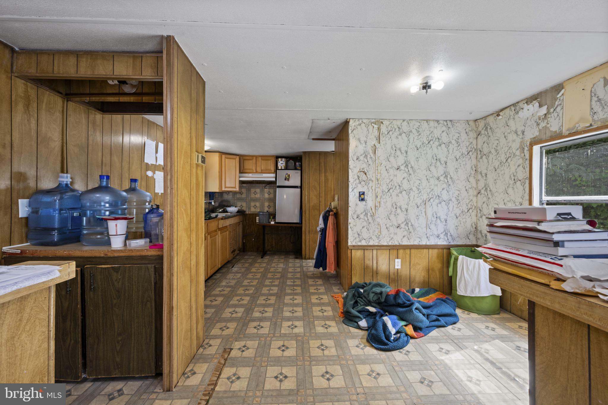 8030 Keeton Road Elkridge, MD 21075 - Photo 26 of 44 a kitchen with a sink and cabinets