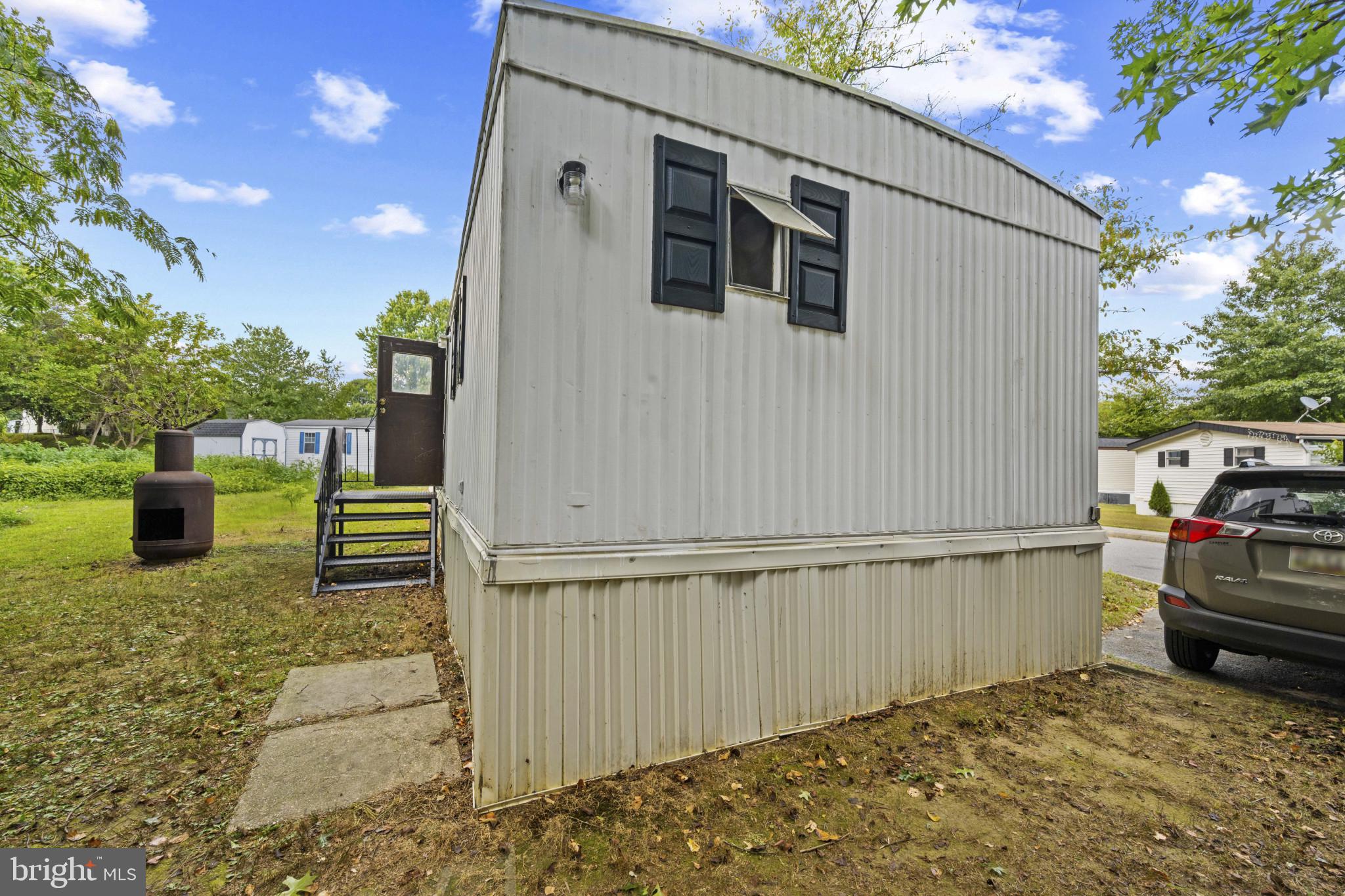 8030 Keeton Road Elkridge, MD 21075 - Photo 40 of 44 a view of a terrace with wooden fence