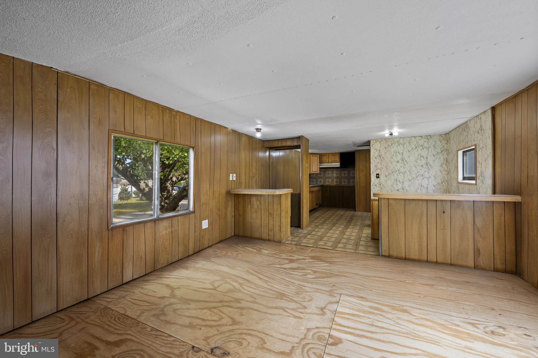 8030 Keeton Road Elkridge, MD 21075 - Photo 4 of 44 a view of a kitchen with furniture and a window