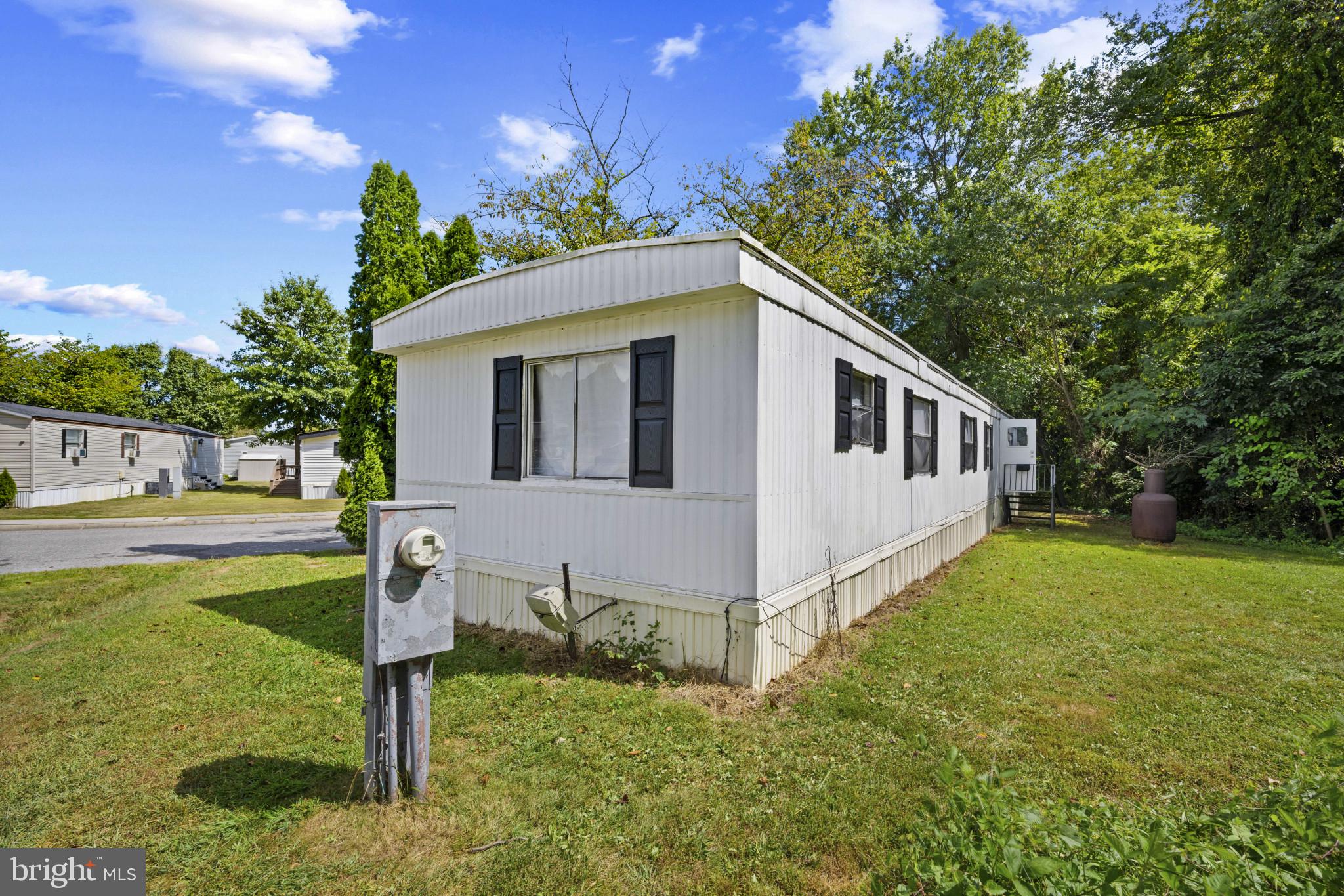 8030 Keeton Road Elkridge, MD 21075 - Photo 41 of 44 a front view of a house with garden