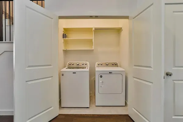 a utility room with dryer and washer