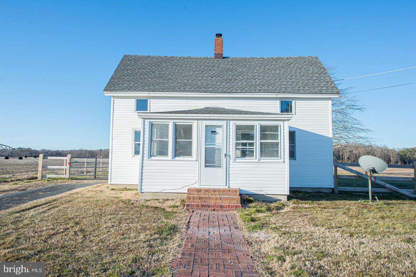 35534 Mt Hermon Road Pittsville, MD 21850 - Photo 1 of 52 a front view of a house with garden