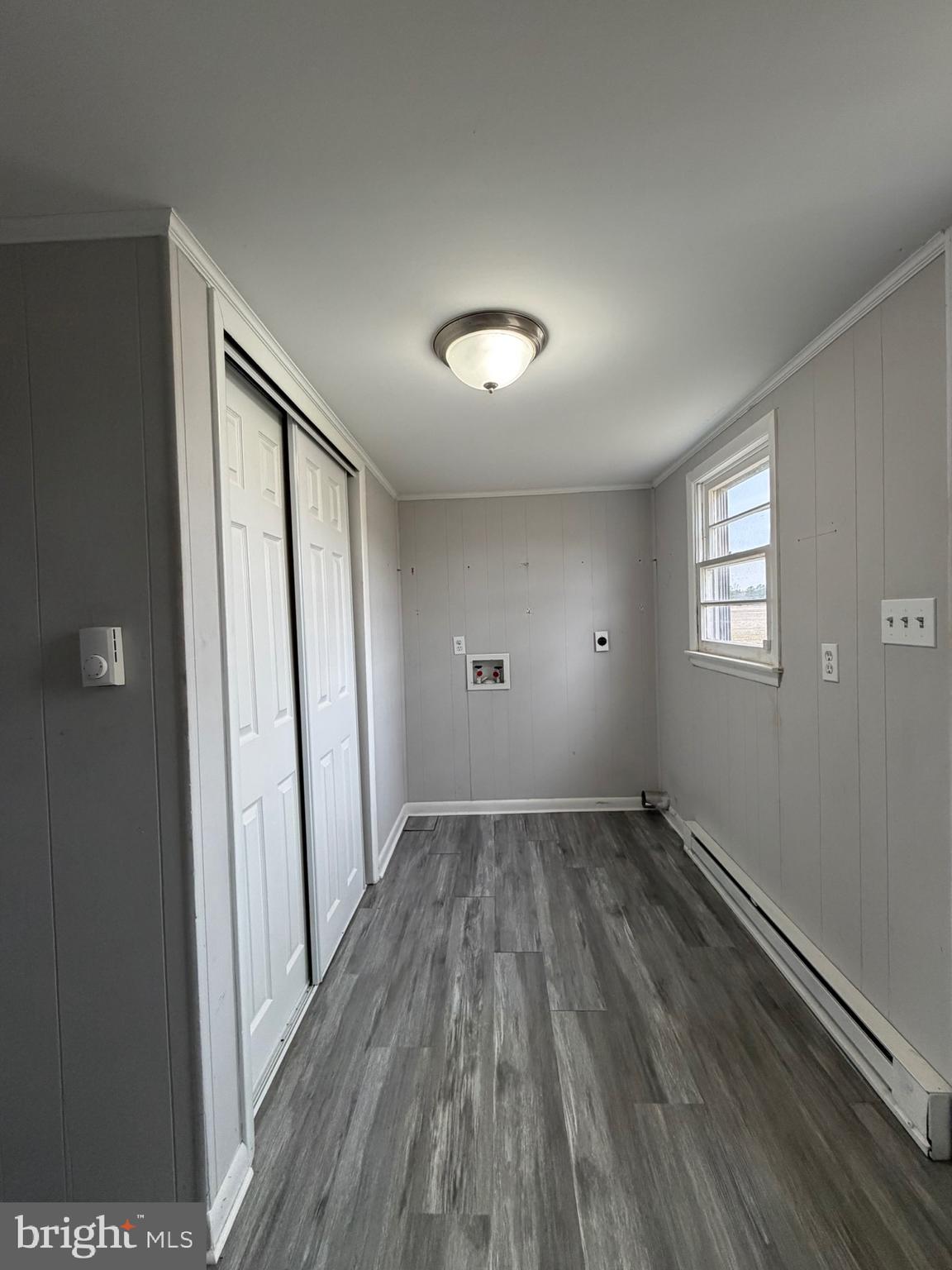 35534 Mt Hermon Road Pittsville, MD 21850 - Photo 25 of 52 wooden floor in an empty room with a window