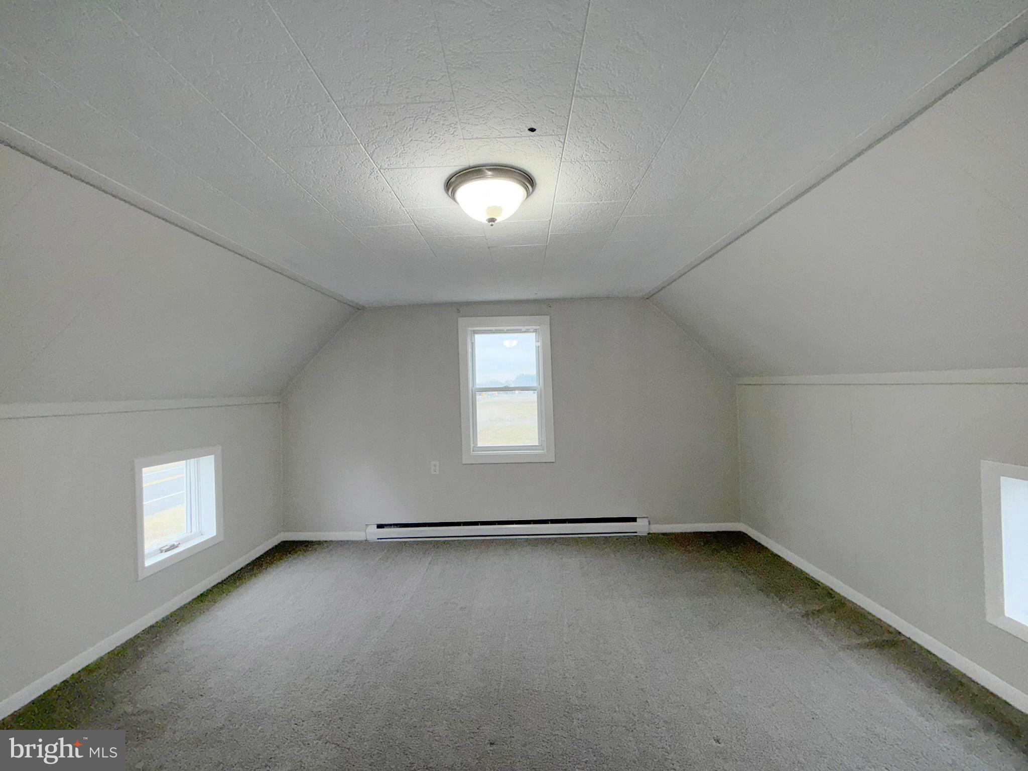 35534 Mt Hermon Road Pittsville, MD 21850 - Photo 38 of 52 an empty room with a empty space and windows