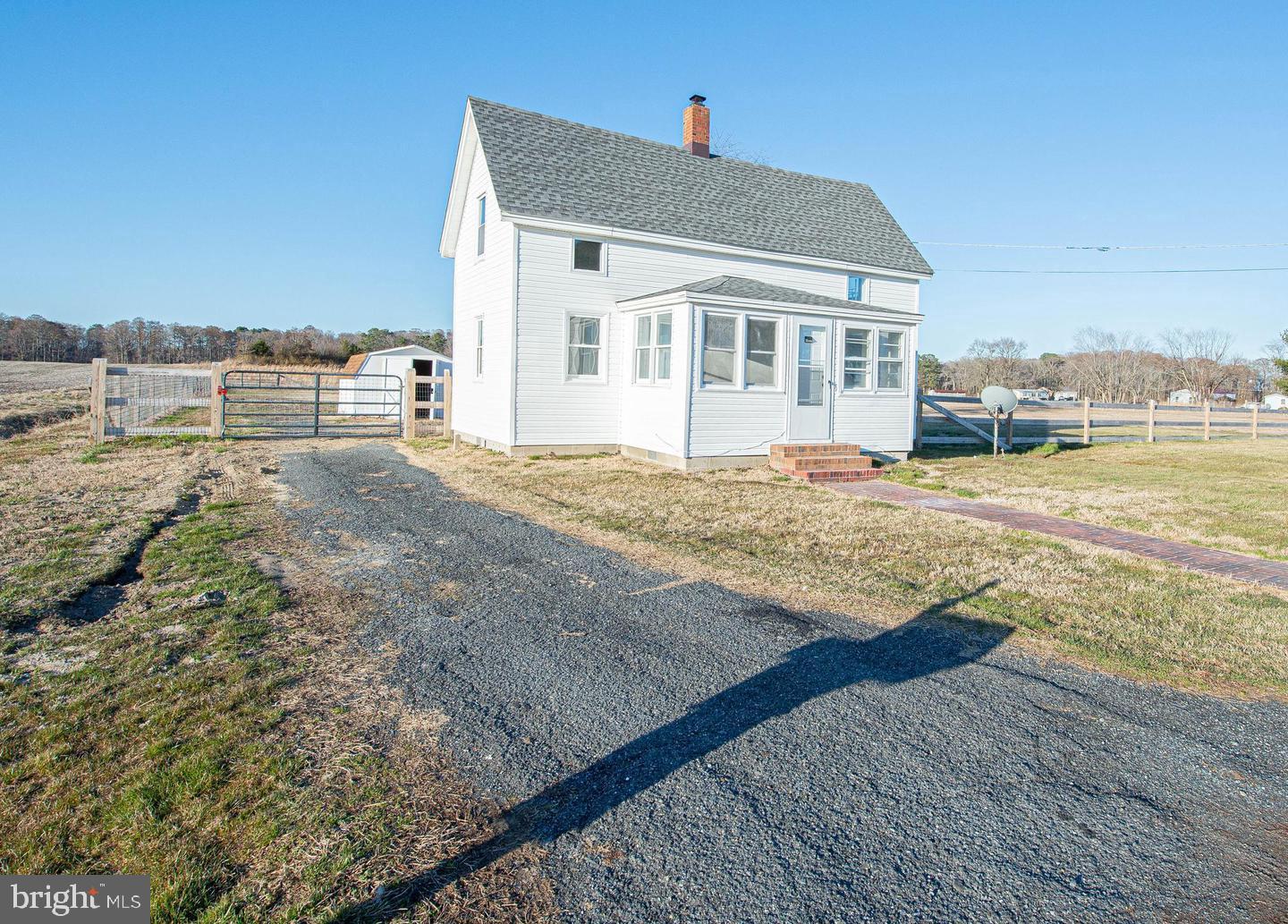 35534 Mt Hermon Road Pittsville, MD 21850 - Photo 4 of 52 a front view of a house with a yard
