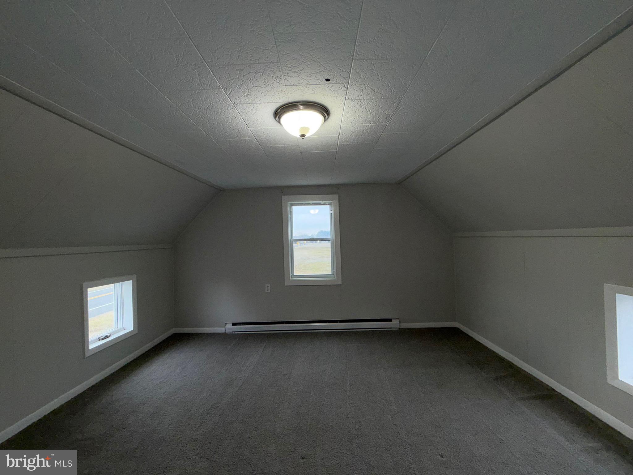 35534 Mt Hermon Road Pittsville, MD 21850 - Photo 47 of 52 an empty room with a empty space and windows