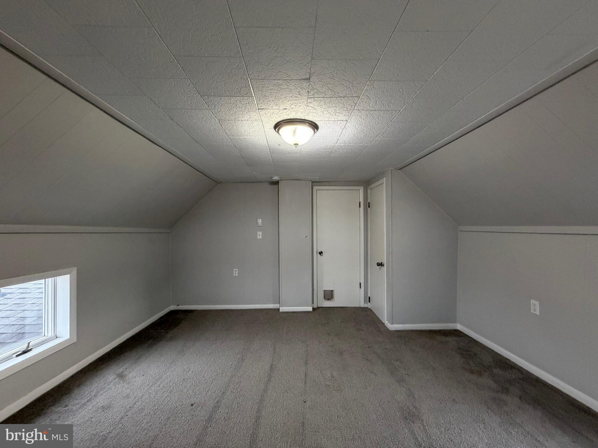 35534 Mt Hermon Road Pittsville, MD 21850 - Photo 49 of 52 an empty room with a empty space and windows