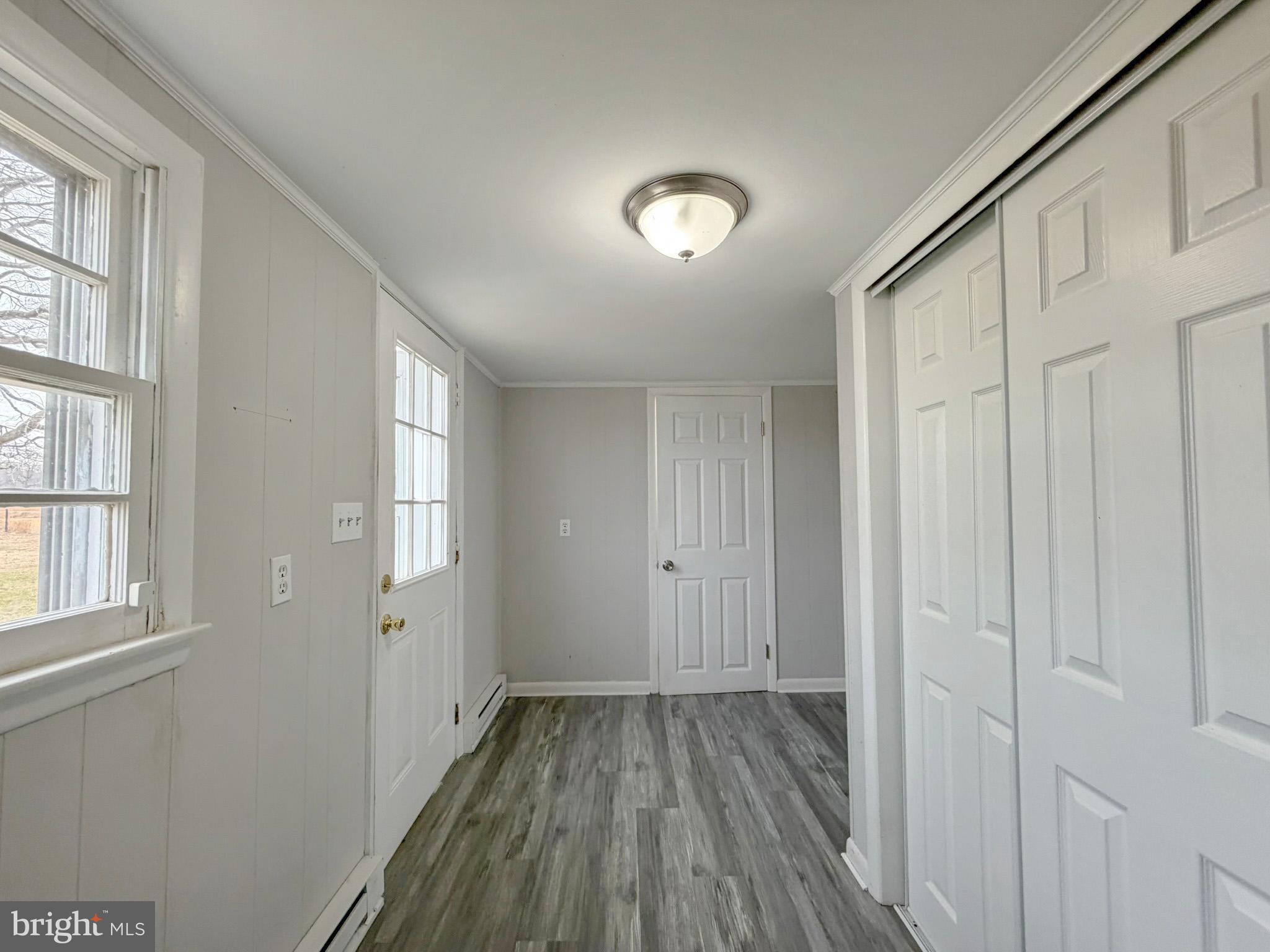 35534 Mt Hermon Road Pittsville, MD 21850 - Photo 10 of 52 a view of a room with wooden floor and windows