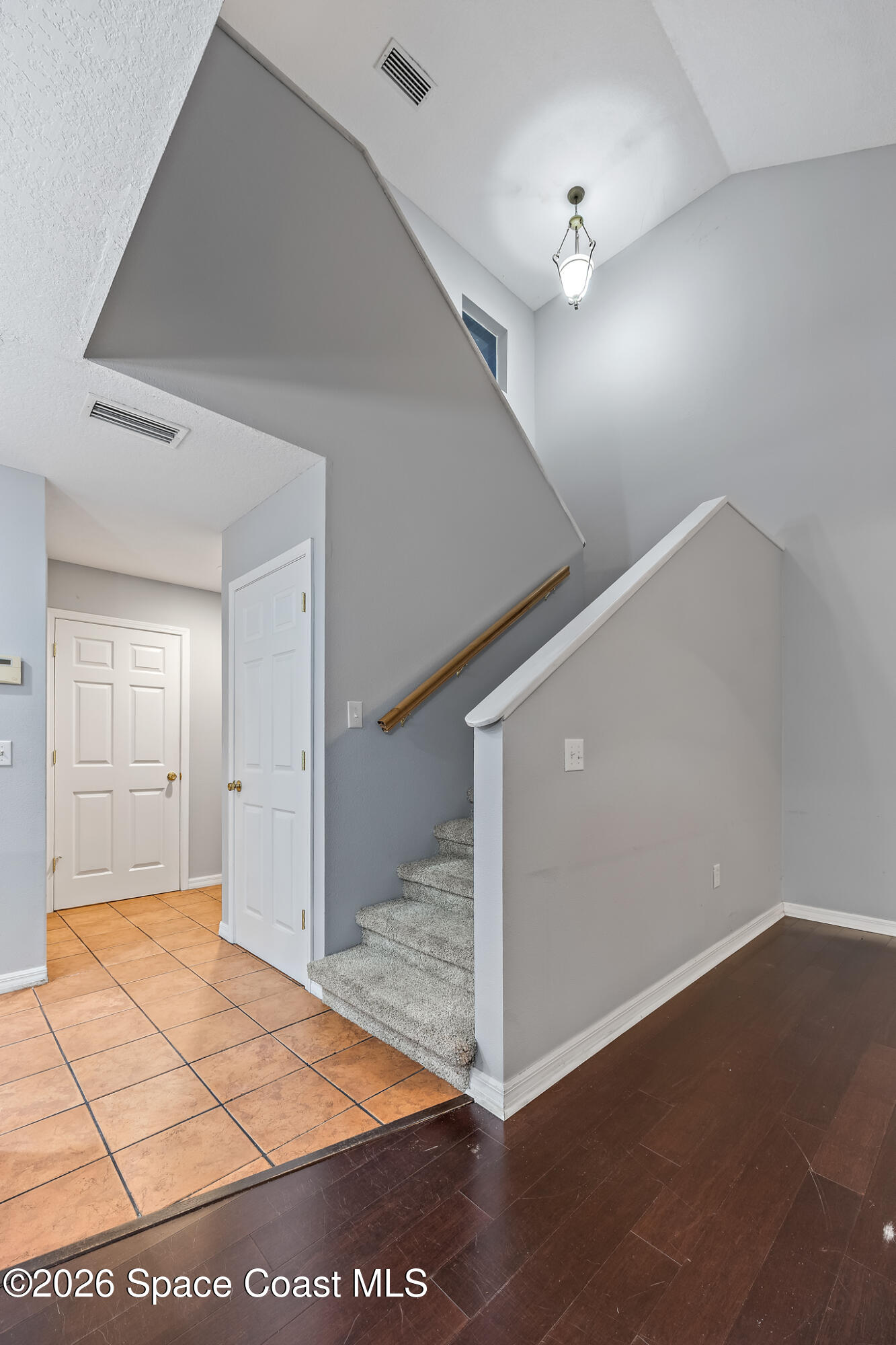 503 Arbor Ridge Lane Titusville, FL 32780 - Photo 13 of 40 ENTRYWAY TO STAIRS