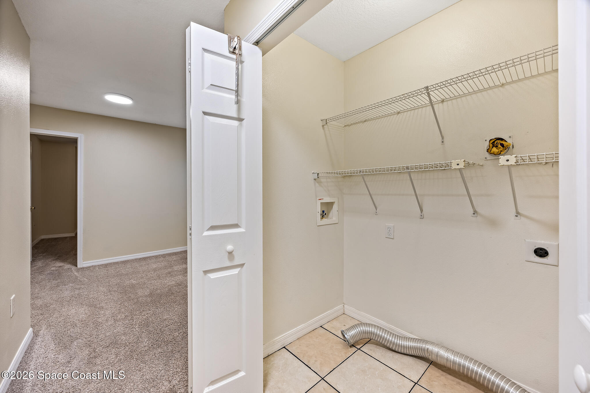 503 Arbor Ridge Lane Titusville, FL 32780 - Photo 23 of 40 LAUNDRY CLOSET