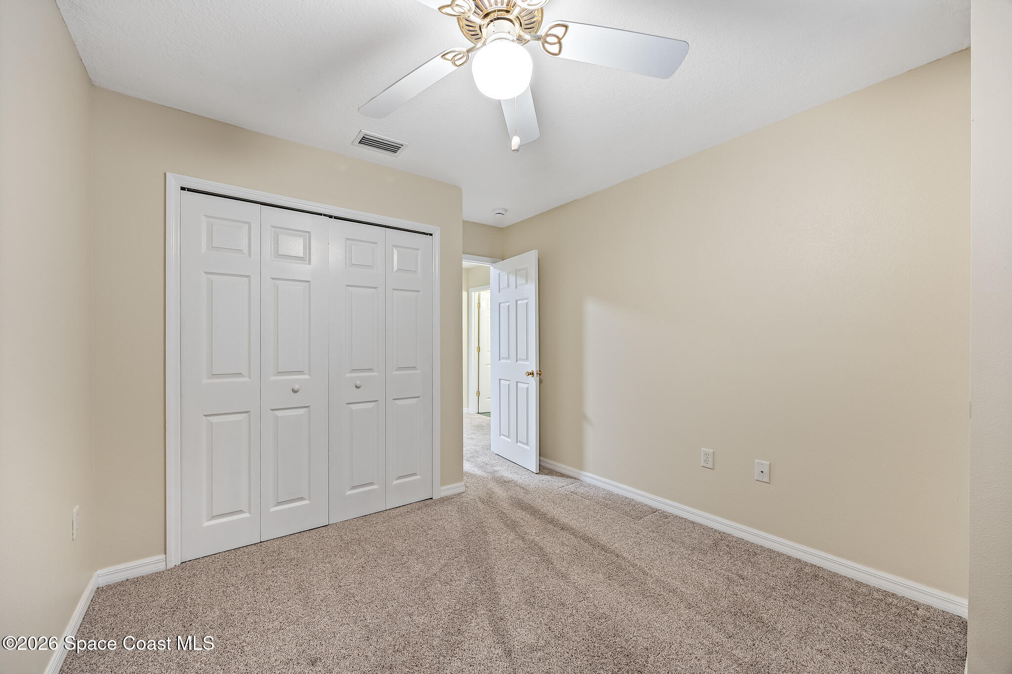 503 Arbor Ridge Lane Titusville, FL 32780 - Photo 25 of 38 a view of an empty room with a window