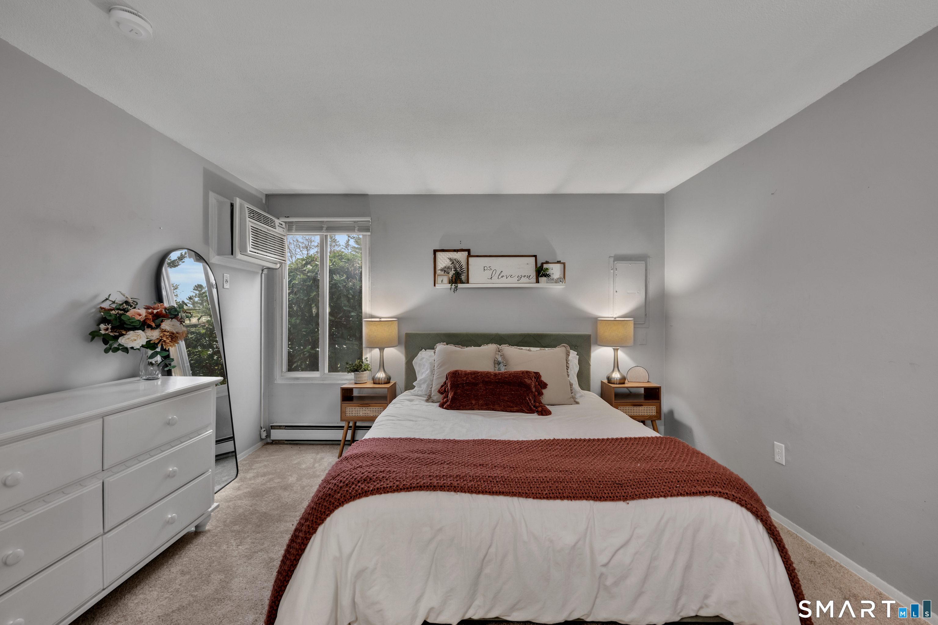 56 Cinnamon Spring, Unit 56 South Windsor, CT 06074 - Photo 15 of 31 a bedroom with a bed and a dresser