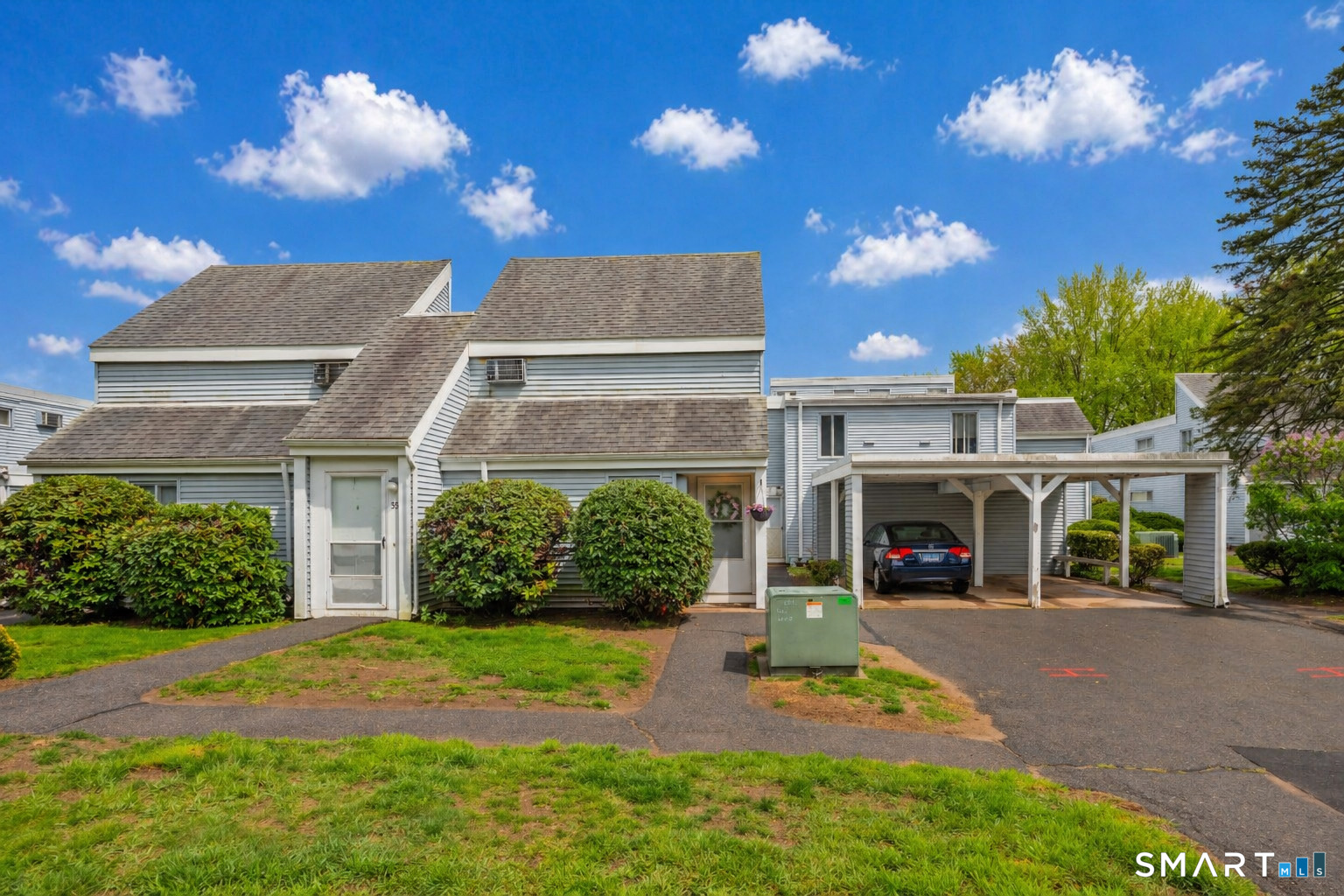 56 Cinnamon Spring, Unit 56 South Windsor, CT 06074 - Photo 3 of 31 a view of a house with yard and plants