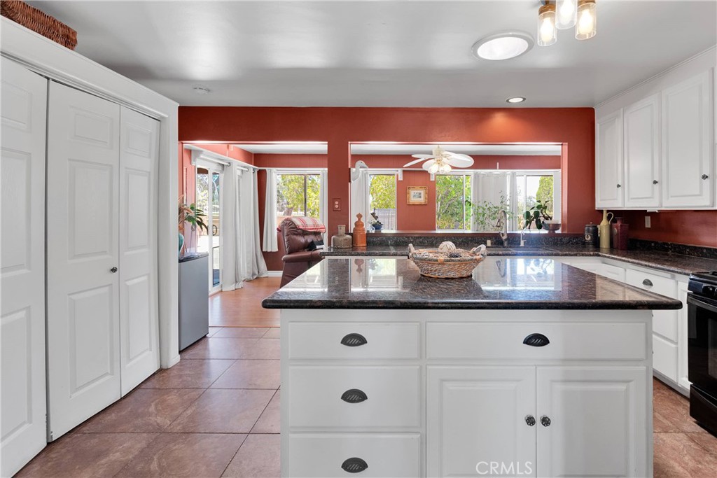19955 Chickasaw Road Apple Valley, CA 92307 - Photo 20 of 60 a kitchen with stainless steel appliances granite countertop a sink and a cabinets
