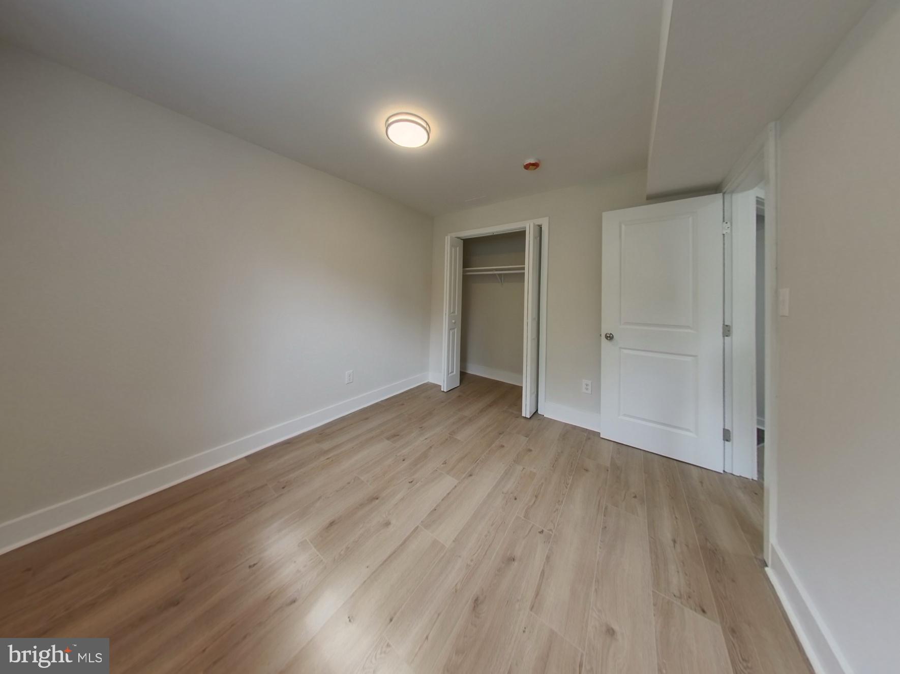7803 Fordson Road Alexandria, VA 22306 - Photo 20 of 30 a view of wooden floor and windows in a room
