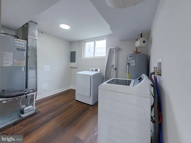 a view of a room with washer and dryer