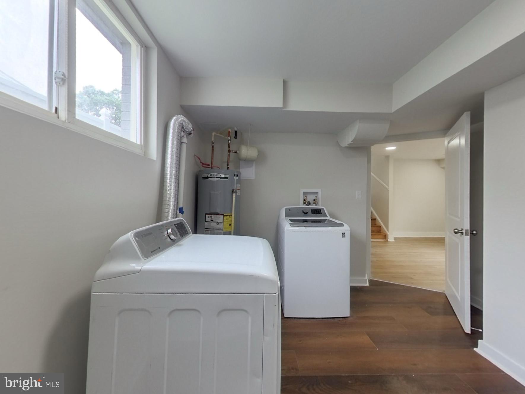 7803 Fordson Road Alexandria, VA 22306 - Photo 22 of 30 a utility room with dryer and washer