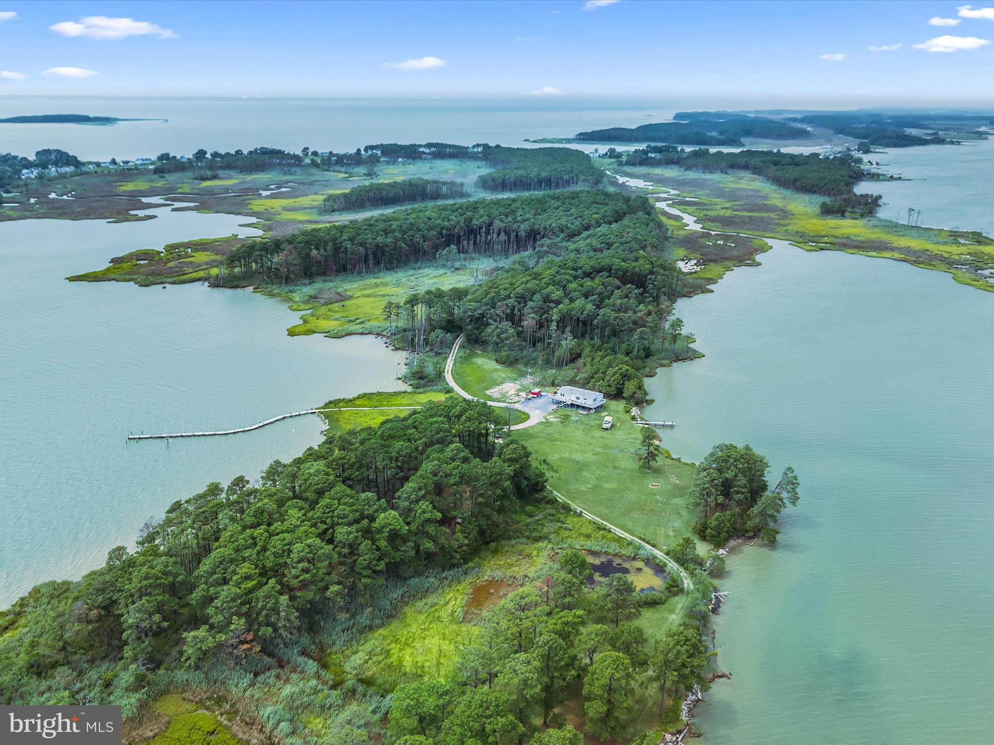 2765 Hoopers Island Road Fishing Creek, MD 21634 - Photo 15 of 111 a view of a lake with a city