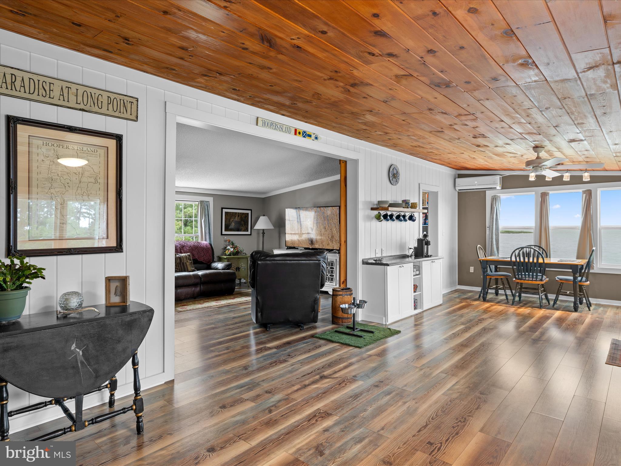 2765 Hoopers Island Road Fishing Creek, MD 21634 - Photo 20 of 111 a living room with furniture and wooden floor
