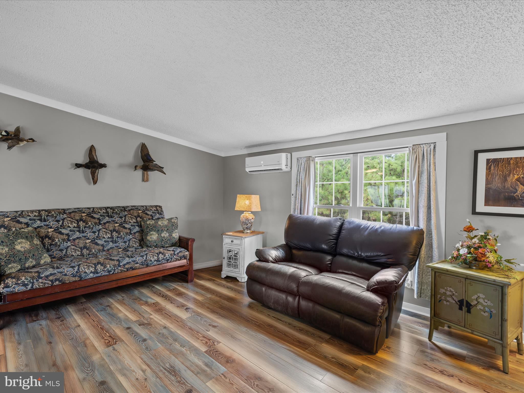2765 Hoopers Island Road Fishing Creek, MD 21634 - Photo 25 of 111 a living room with furniture and a window