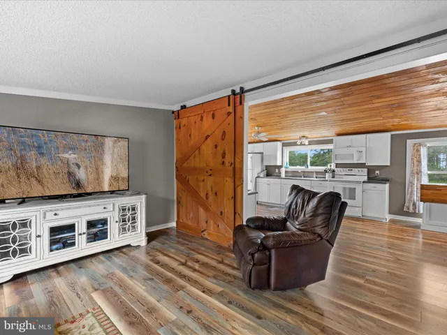 a view of a garage with a table and chairs