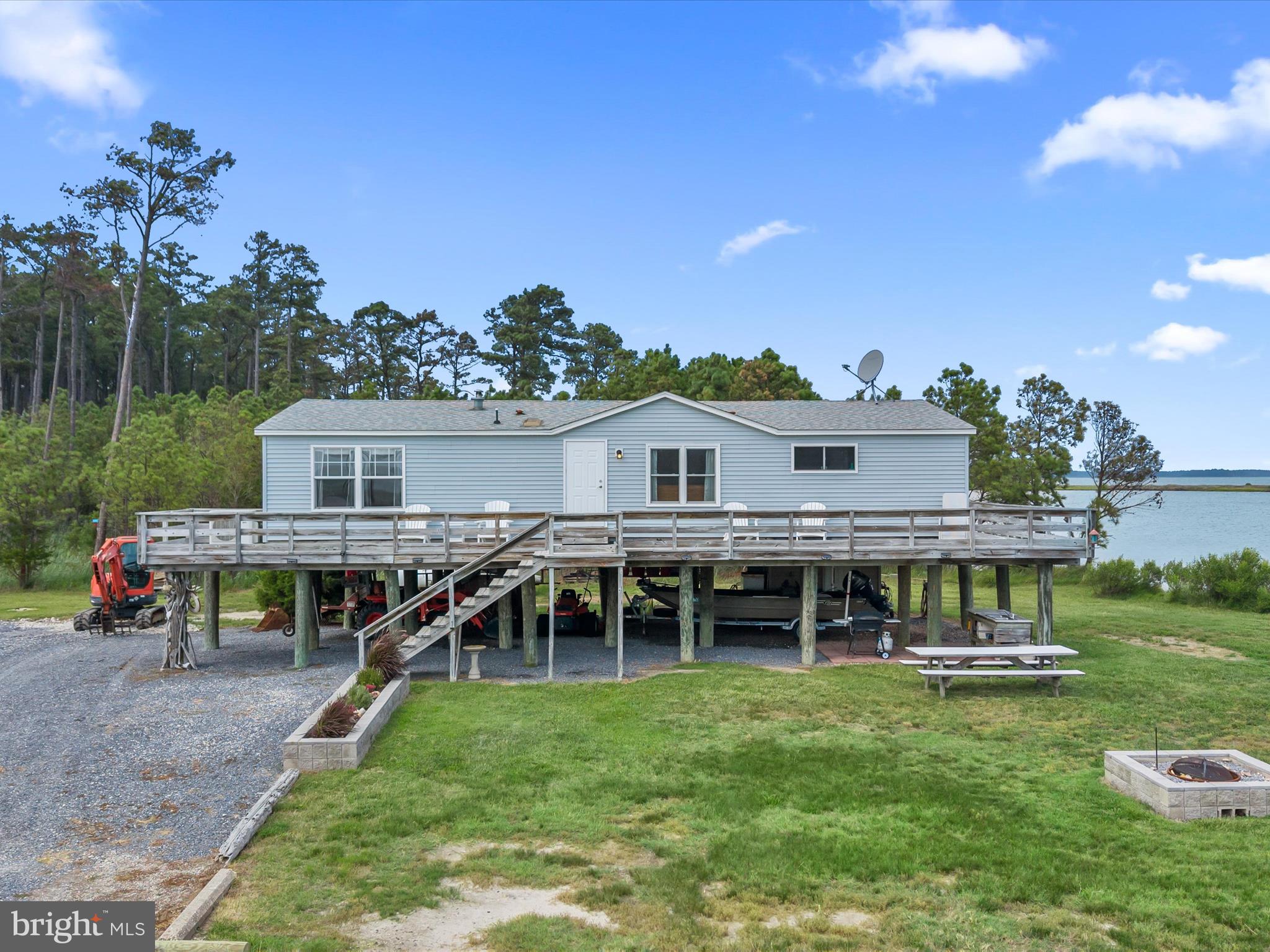 2765 Hoopers Island Road Fishing Creek, MD 21634 - Photo 3 of 111 a view of a house with a backyard