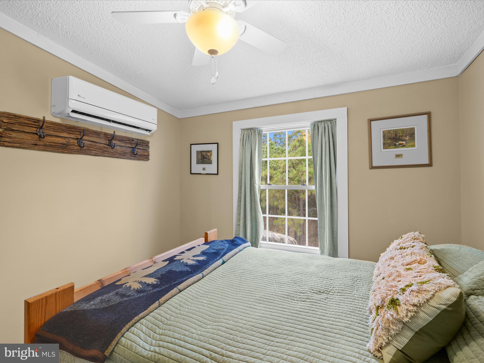 2765 Hoopers Island Road Fishing Creek, MD 21634 - Photo 31 of 111 a bedroom with bed and a window