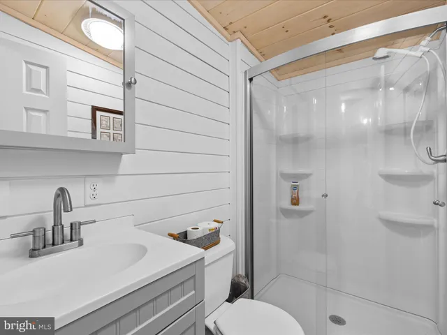 a view of a lake with a yard