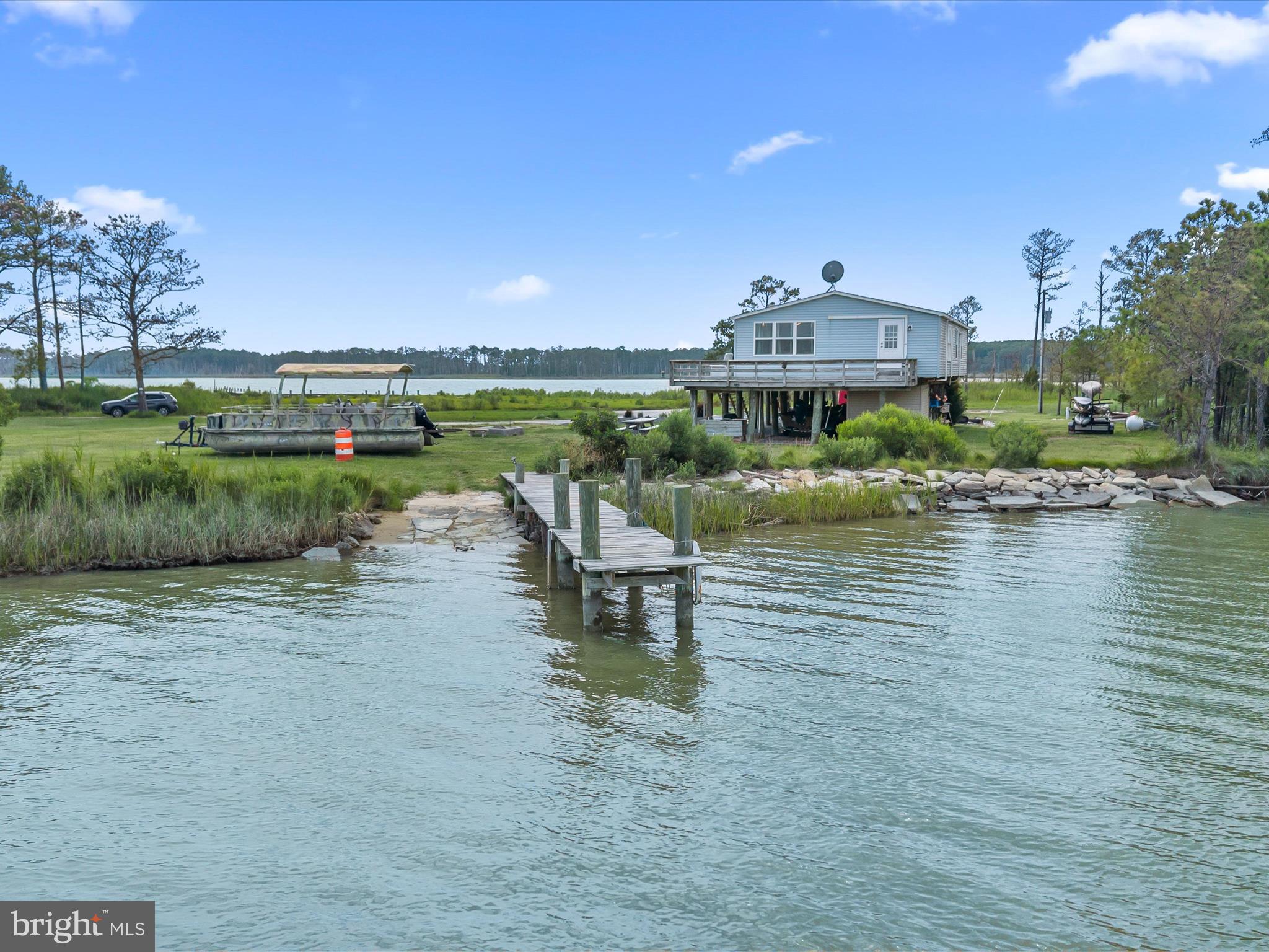 2765 Hoopers Island Road Fishing Creek, MD 21634 - Photo 65 of 111 a view of a lake with a big yard