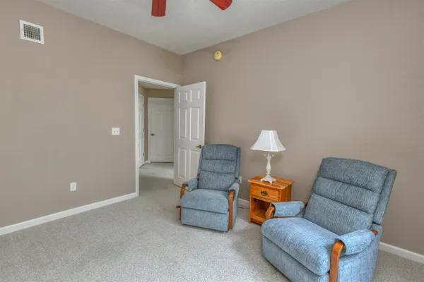 a living room with furniture and a couch