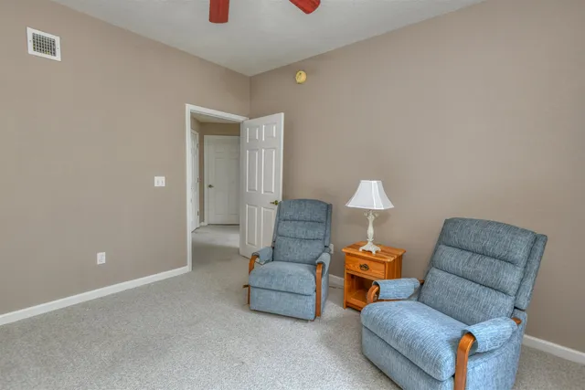 a living room with furniture and a couch