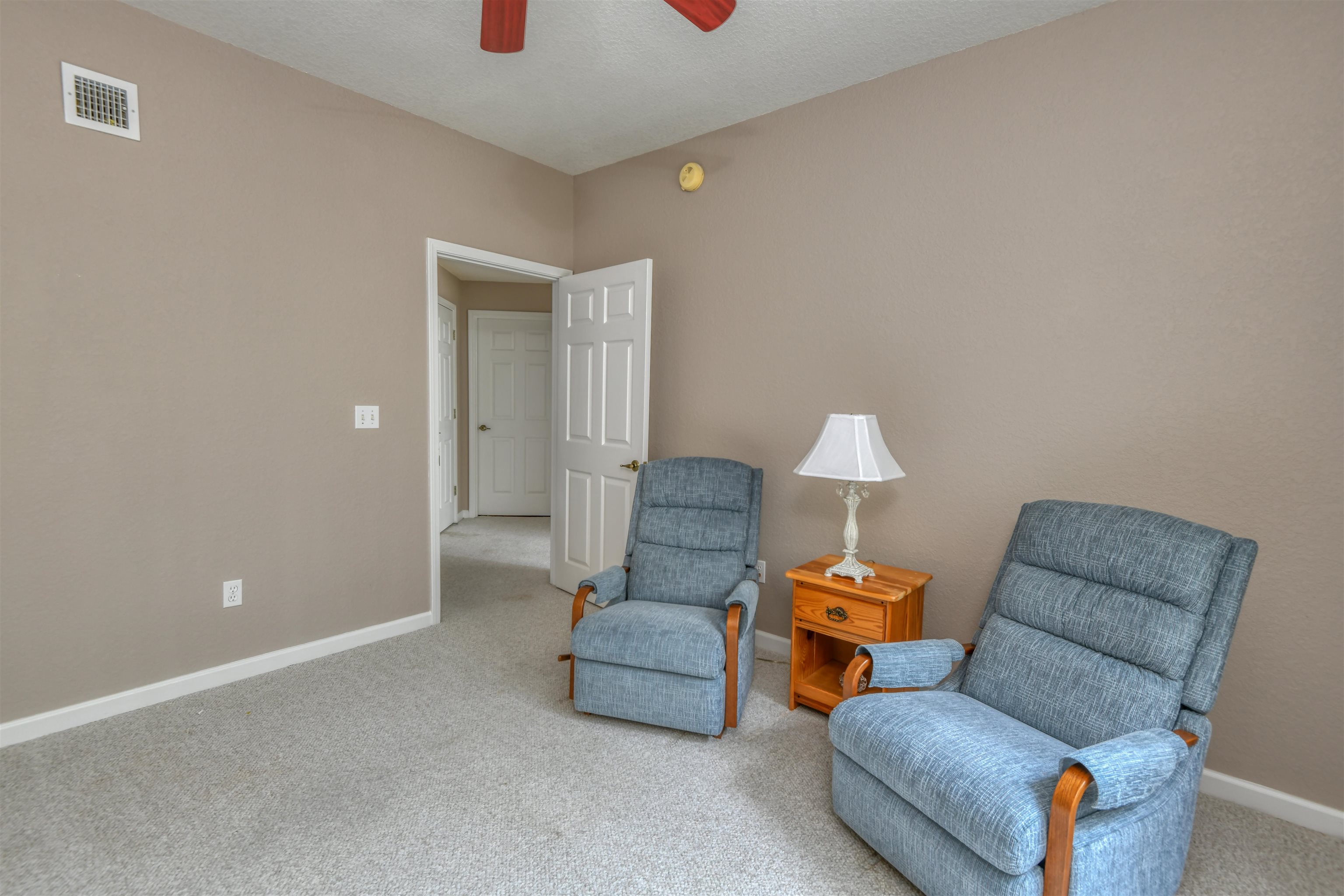 2202 Vista Cove Road St. Augustine, FL 32084 - Photo 19 of 38 a living room with furniture and a couch