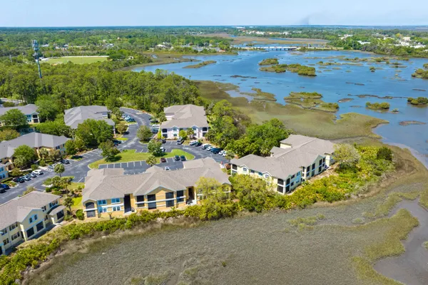 an aerial view of a houses with outdoor space