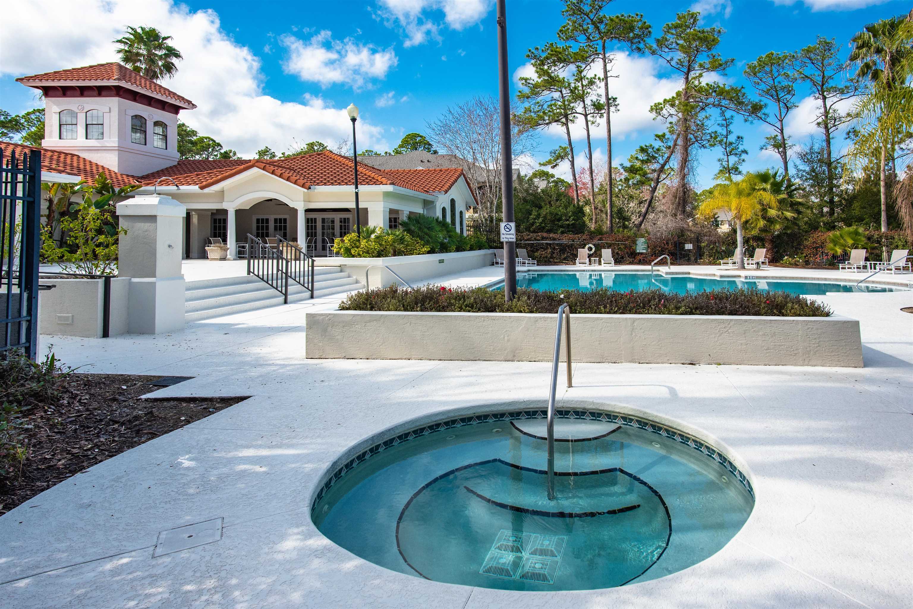 2202 Vista Cove Road St. Augustine, FL 32084 - Photo 25 of 38 a swimming pool with a yard